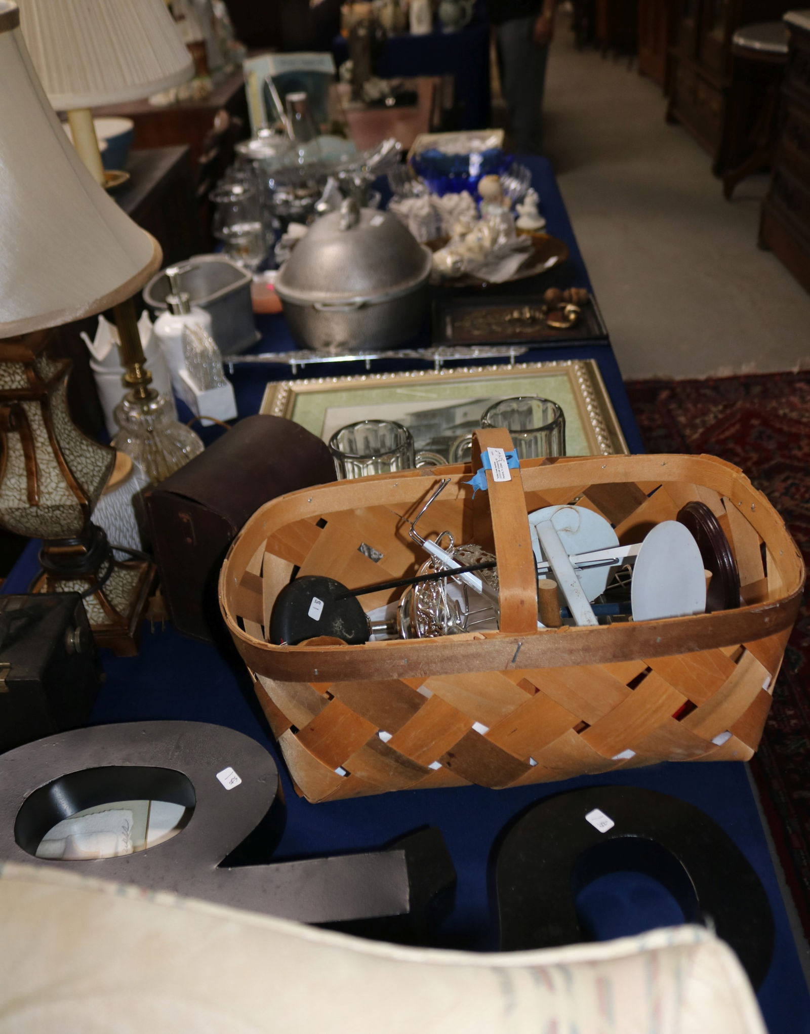 8' TABLE LOT OF 57 ITEMS, CAST ALUMINUM DOLLS,: ETC.