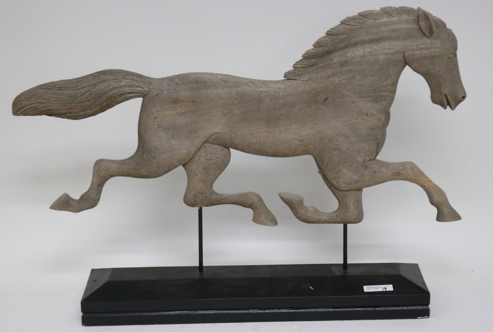 CONTEMPORARY CARVED RUNNING HORSE SCULPTURE ON: CUSTOM BASE, DRIFTWOOD FINISH, 18 1/4" H, 25 3/4" W, 5 1/2" D