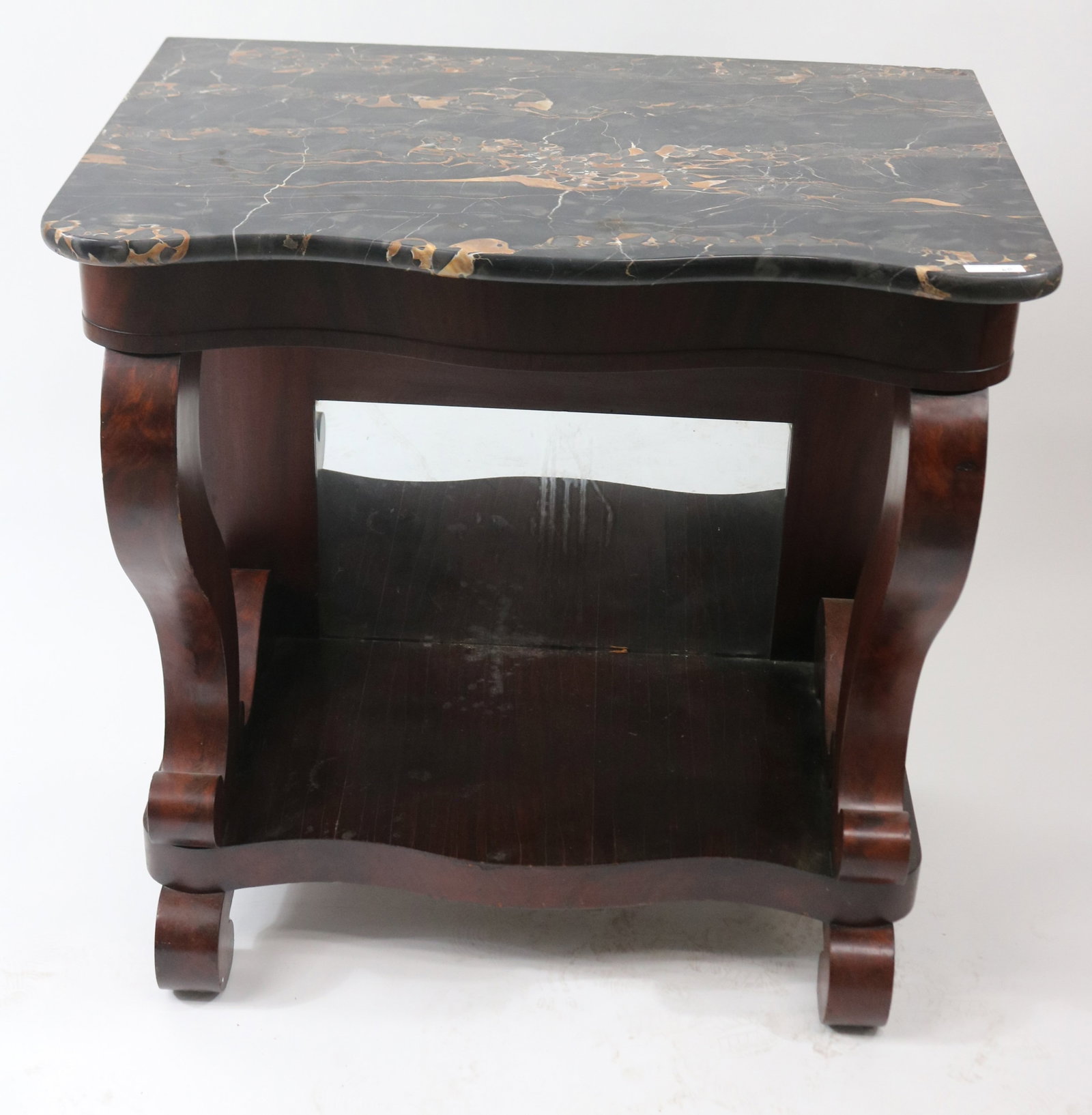 19TH C. MAHOGANY PETTI COAT TABLE, MAHOGANY: VENEER, BLACK MARBLE SHAPED TOP, SCROLL LEGS, MIRROR BACK, SCROLL FEET, OLD FINISH, 33" H, 30 1/2" W, 21 1/4" D