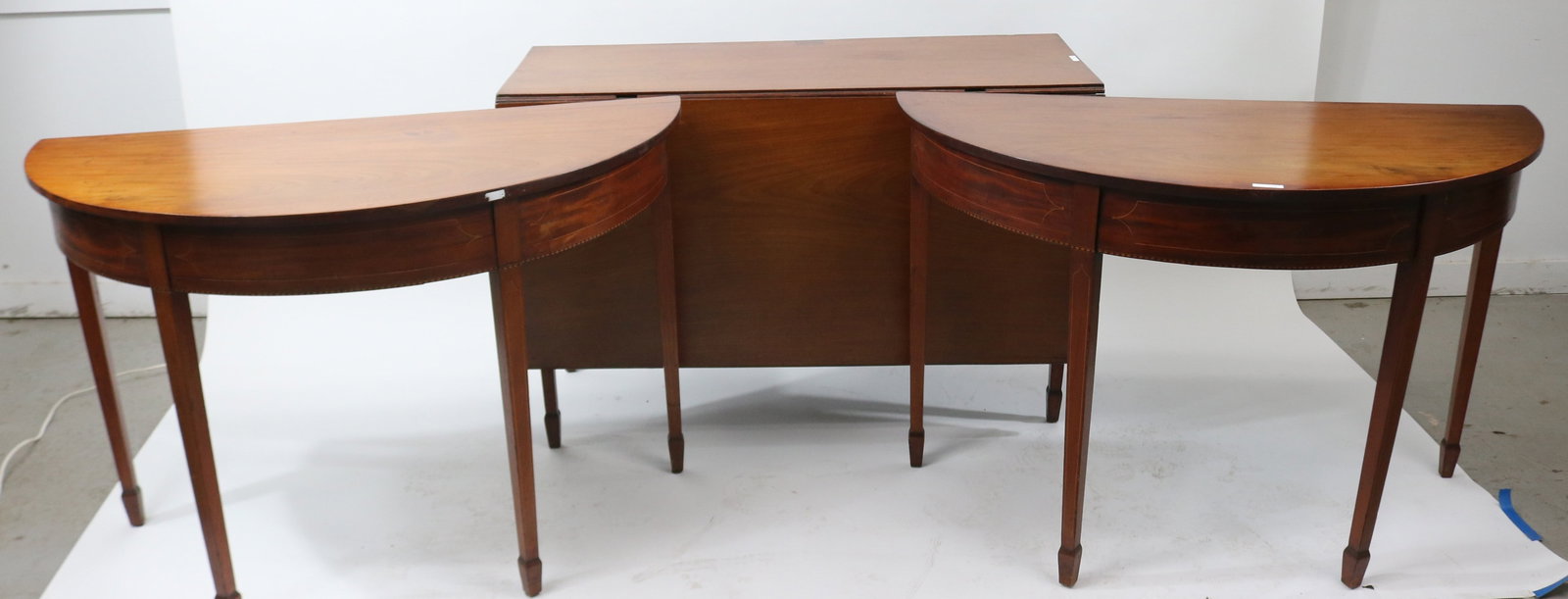 19TH C. 3 PART HEPPLEWHITE BANQUET TABLE,: MAHOGANY WITH LINE & BAND INLAY, 29 1/2" H, 46" W, OVERALL 106 1/2" L, CENTER 19" W, 21 1/2" DROP LEAF, ENDS 22 1/2" D, OLD REFINISHED CONDITION, ARE APPROPRIATE WEAR