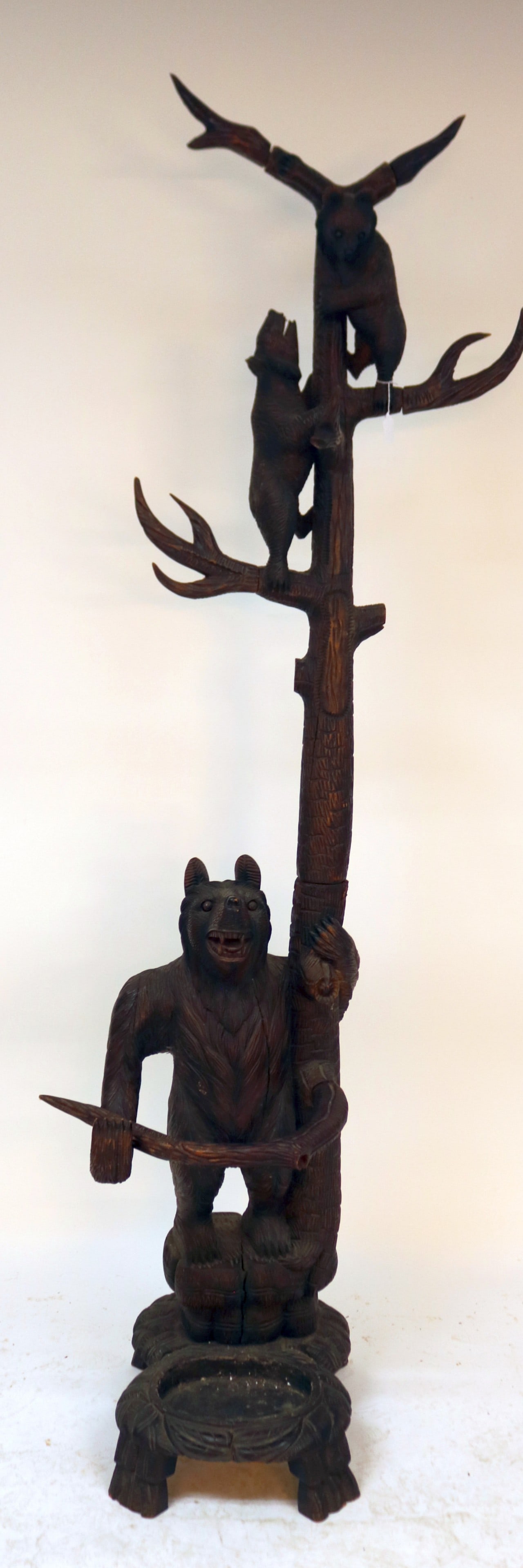 BLACK FOREST STYLE CARVED BEAR UMBRELLA STAND,: STANDING BEAR WITH GLASS EYE & 2 CUBS IN BRANCHES, 20TH C. DARK FINISH, 83 1/2" H, 19 1/2" W, 20" D