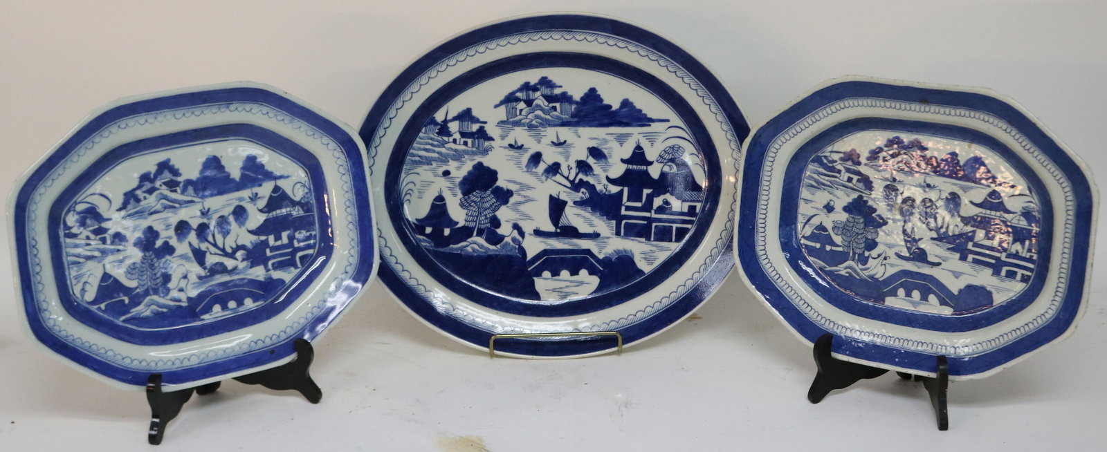 THREE 19TH C. CANTON PLATTERS, 16 1/2" X 13 1/2": OVAL & TWO 13 1/4" X 10 1/2"