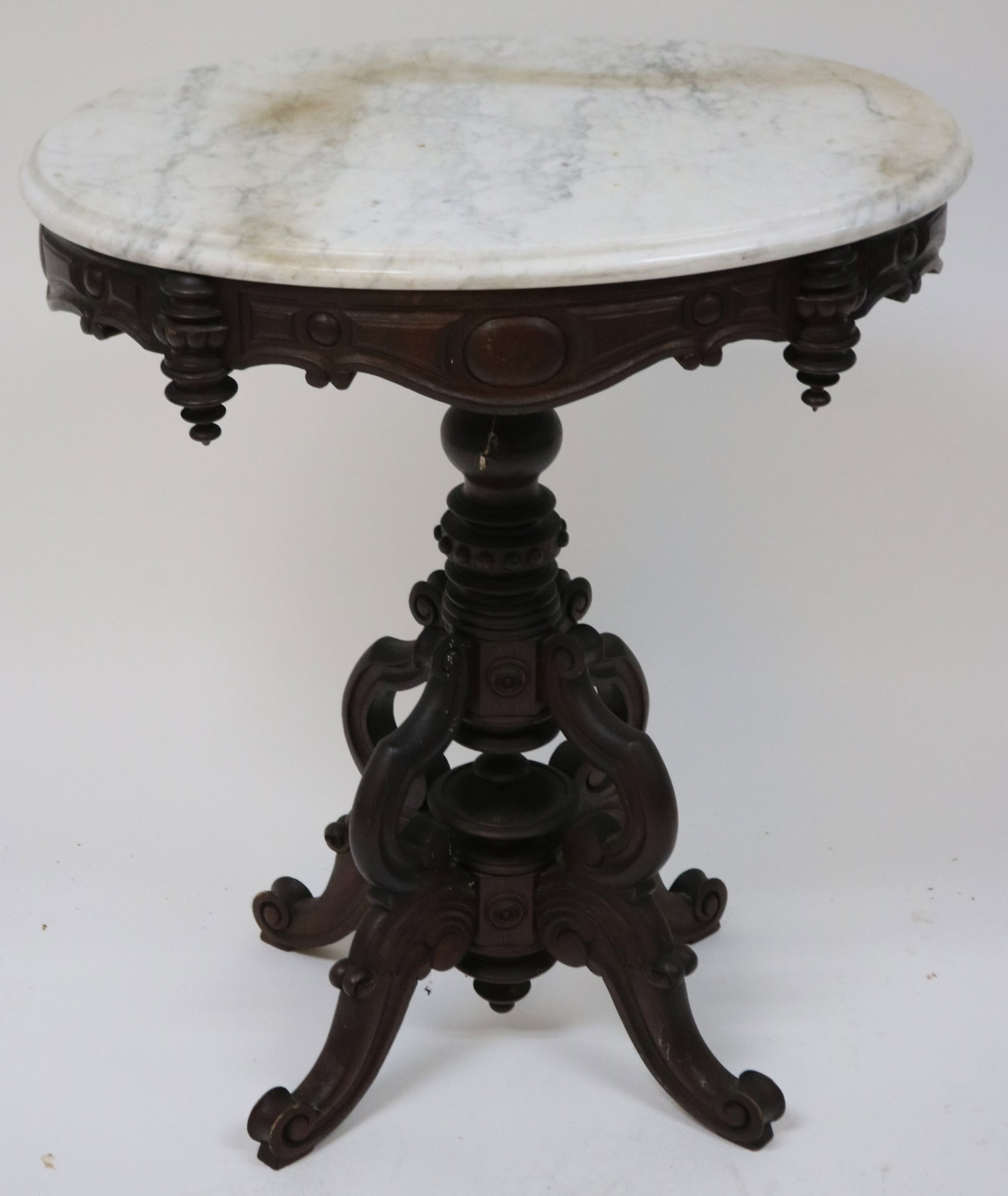ORNATE VICTORIAN WALNUT OVAL MARBLE TOP TABLE,: ORIGINAL FINISH, SHAPED SKIRT, 29 1/2" H, 25" W, 18 1/2" D