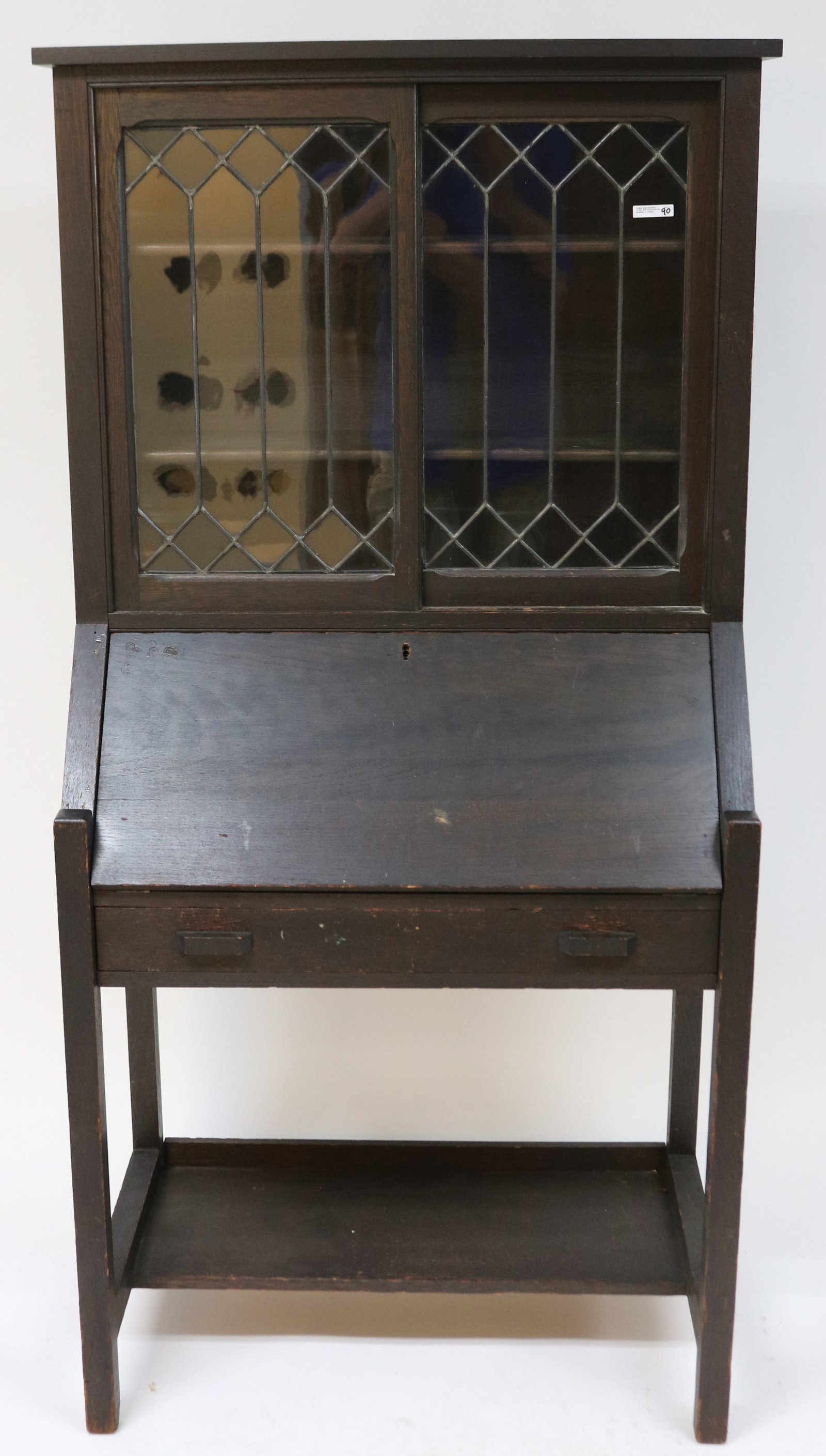 MISSING OAK SECRETARY DESK WITH DANNER STYLE: SLIDING LEADED DOORS, 62 1/2" H, 30" W, 17 1/2" D, OLD DARK FINISH