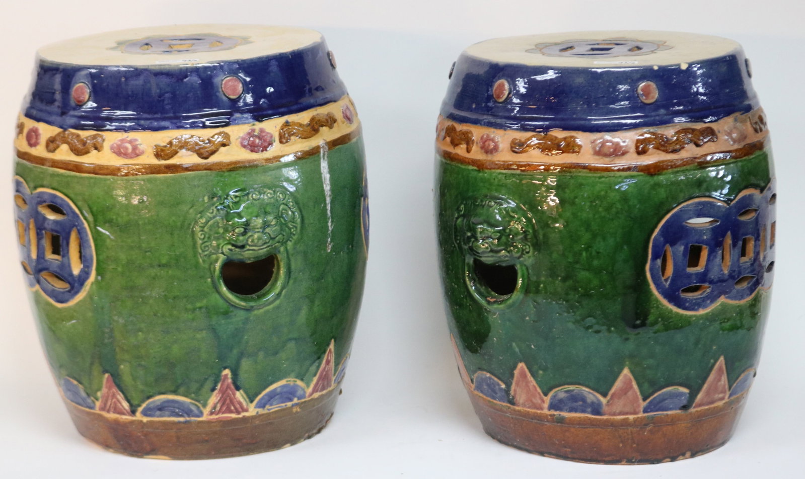 2 ASIAN PORCELAIN GARDEN SEATS, 20TH C. EMBOSSED: FOO DOG DECORATION, 17 1/2" H, 15" DIA., MINOR ROUGHAGE