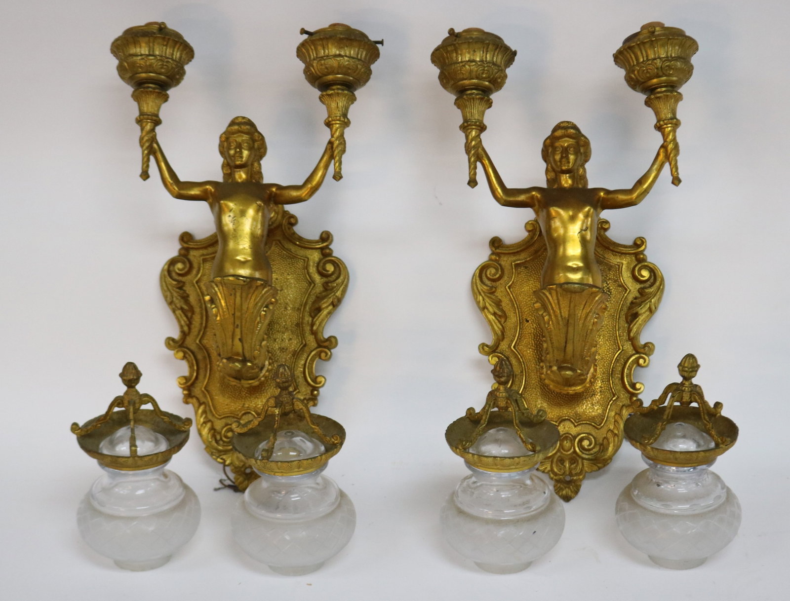 PAIR FIGURAL BRASS 2 ARM SCONCES, GILT BRASS WITH: CUT & FROSTED SHADE, 1 SHADE AS IS, WITH BRASS FINIALS, MARED MADE IN SPAIN, 1 ARM WITH SLIGHT BEND