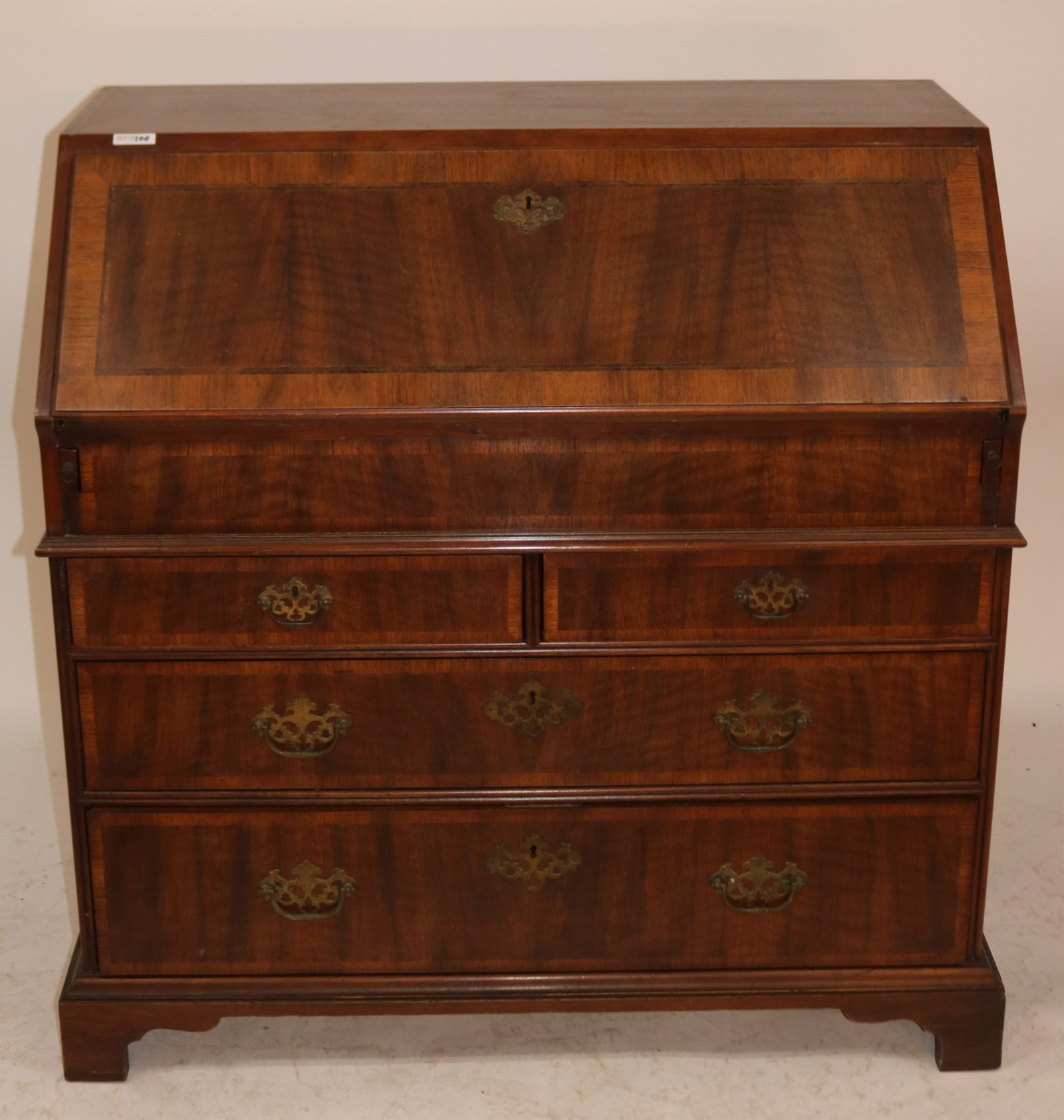 GEORGE III STYLE FALL FRONT DESK, MADE BY JOHN: WIDDICOMB, OAK SECONDARY, MISSING INTERIOR SURFACE, BANDED WITH BURL PANELS, 40 1/4" H, 41" W, 20 1/2" D