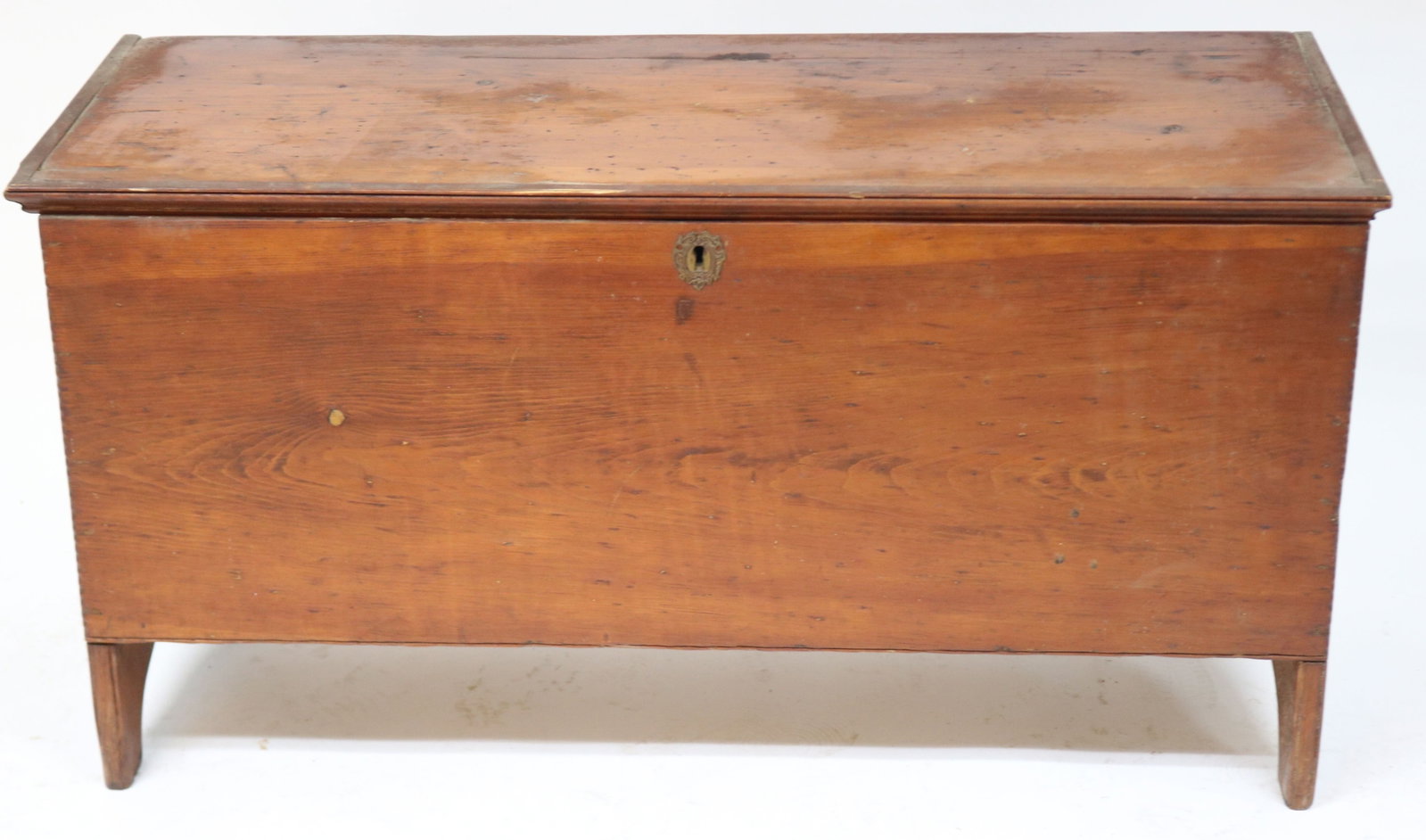 19TH C. PINE LIFT TOP BLANKET CHEST, OLD: REFINISHED CONDITION, CUT OUT ENDS, OLD TILL, 23" H, 44" W, 16 3/4" D, CHIP CARVED EDGE