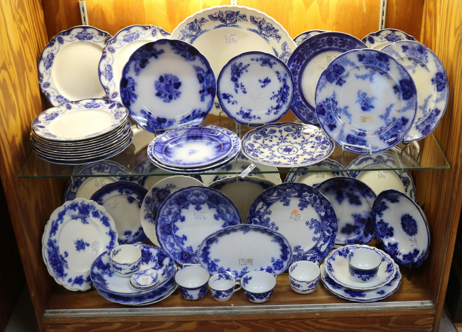 53 PCS. FLO BLUE, PLATTERS, PLATES, BOWLS, CUPS &: SAUCERS, ETC. 1/2" - 2 1/2" H, 2 3/4" - 14 1/2" W, GOOD OVERALL CONDITION