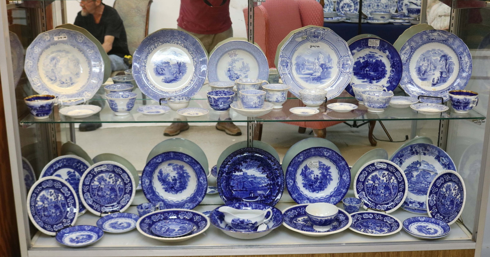 2 SHELF LOT, 49 PIECES OF BLUE & WHITE TRANSFER: WARE, PLATES, BOWLS, CUPS & SAUCERS, GRAVY BOAT, ETC. 1/4" - 3 1/2" H, 3 1/2" - 10 1/2" W