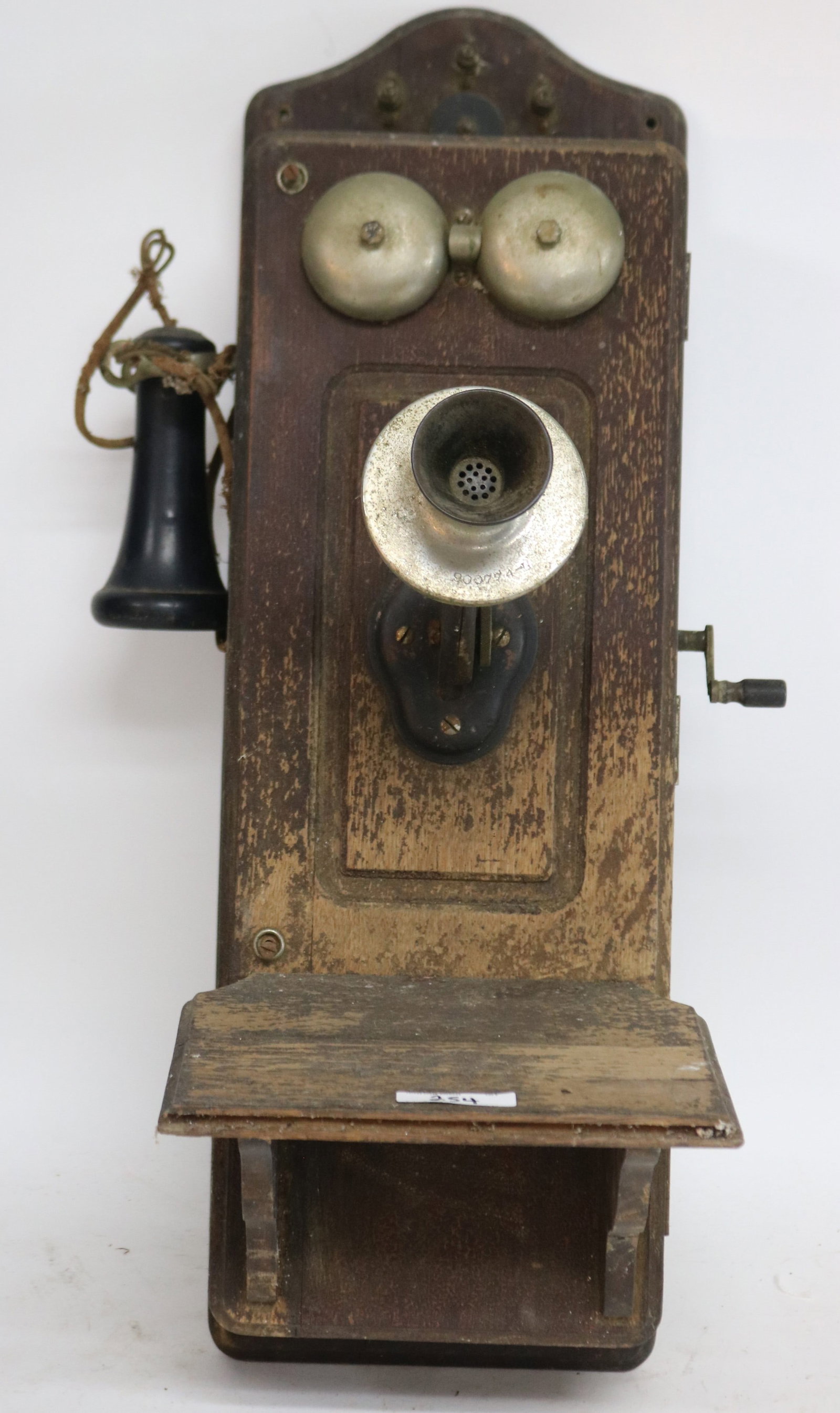 OLD OAK WALL PHONE, AS FOUND CONDITION, WORN: FINISH, HAS INTERIOR, SHELF MISSING PIECE, 24 1/2" H, 8 3/4" W, 11 3/4" D, MADE BY KELLOGG