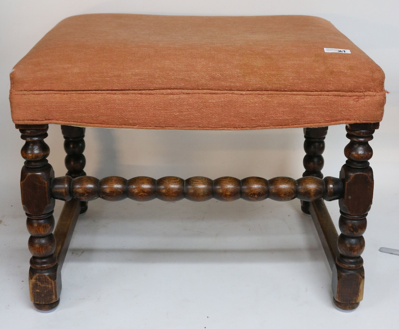 JACOBEAN STYLE STOOL, OAK, OLD FINISH,: UPHOLSTERED TOP, TURNED BASE, 19 1/2" H, 24 1/2" W, 17 1/2" D