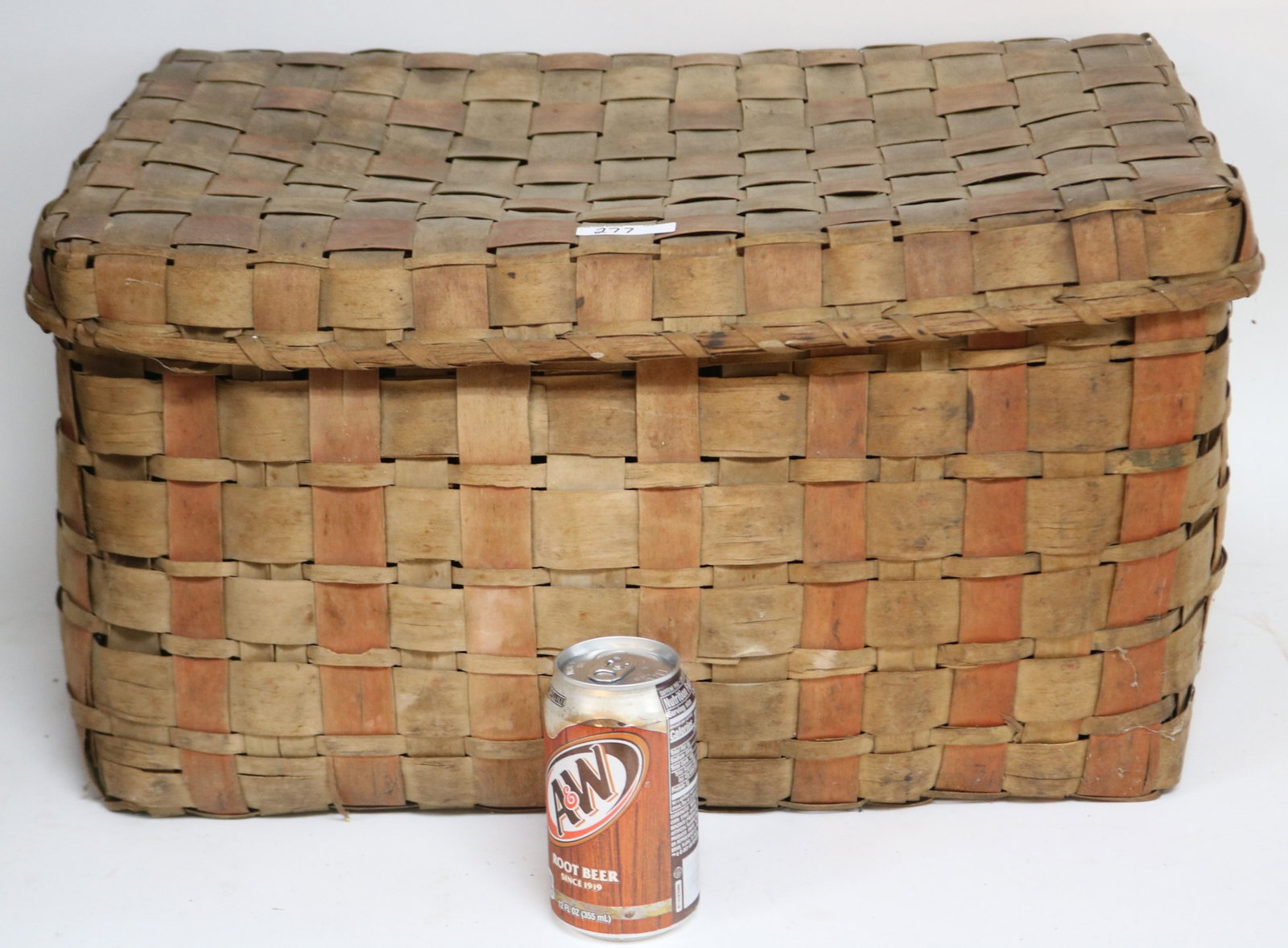 LARGE 19TH C. SPLINT COVERED BASKET, TRACES OF: OLD RED PAINT, 11 1/2" H, 22" W, 15" D, MINOR ROUGHAGE