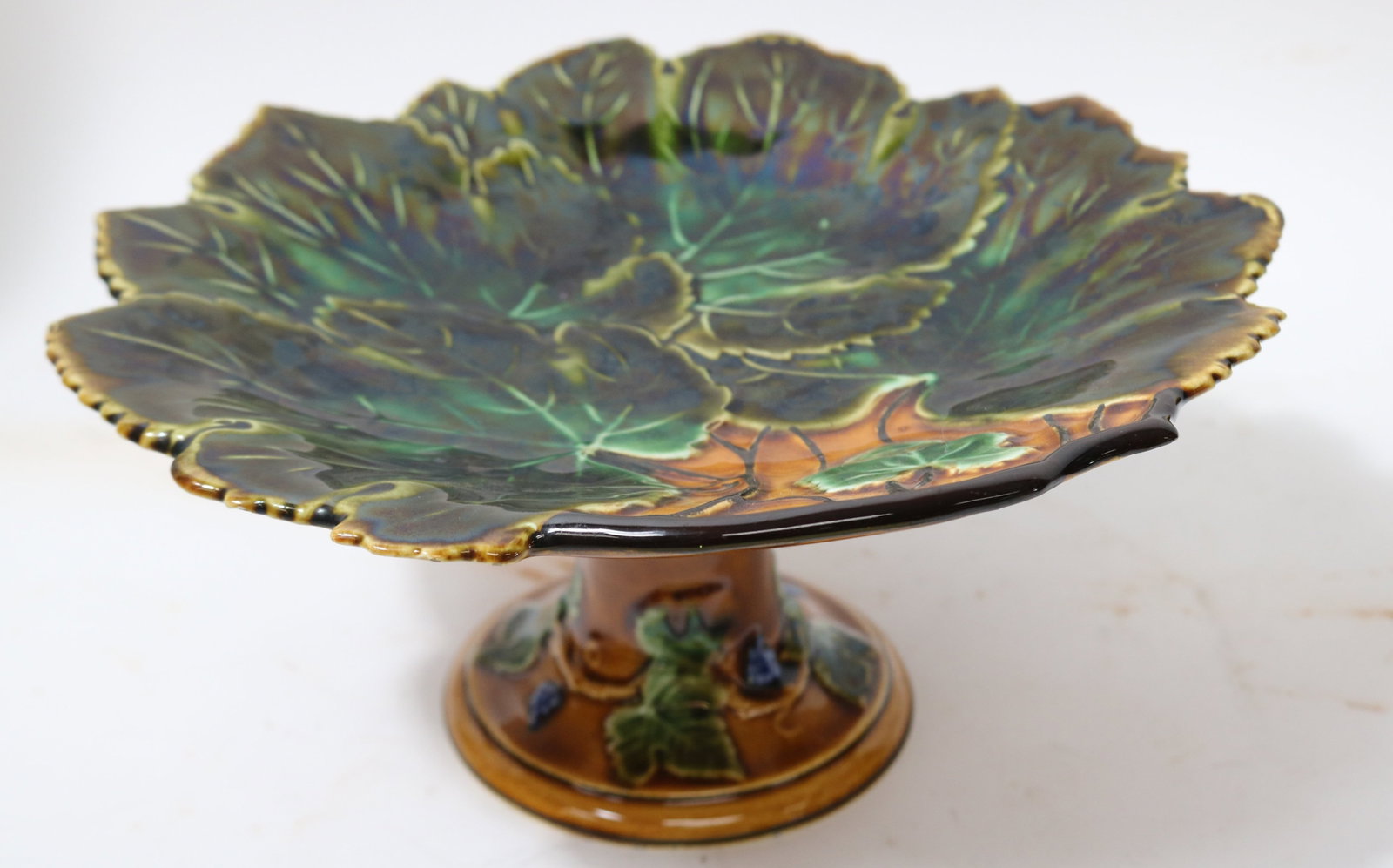 MAJOLICA LEAF DESIGN COMPOTE, 19TH/20TH C. 5" H,: 10 1/2" DIA., MINOR NICK TO UNDERSIDE