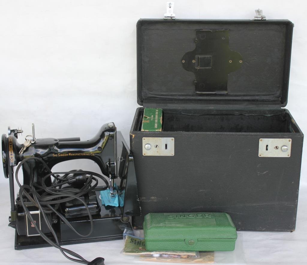 SINGER FEATHERWEIGHT SEWING MACHINE: IN ORIGINAL CASE, COMPLETE WITH MANUALS, ETC. BARELY USED, CASE SIZE 11" H, 14 1/4" W, 8" D
