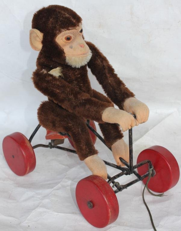 MONKEY PLUSH PULL TOY WITH GLASS EYES: WITH PARTIAL GERMAN LABEL, 10" H, 9" W