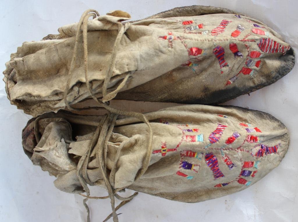 PAIR OF LEATHER NATIVE AMERICAN MOCCASINS: WITH PORCUPINE QUILL DESIGNS, 10 1/2" L, SOME QUILLS MISSING