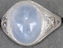 18K WHITE GOLD RING, SET WITH QUALITY STAR: SAPPHIRE AND 4 DIAMONDS, APPROX. 0.5 CT., RING SIZE 7, 8 GRAMS
