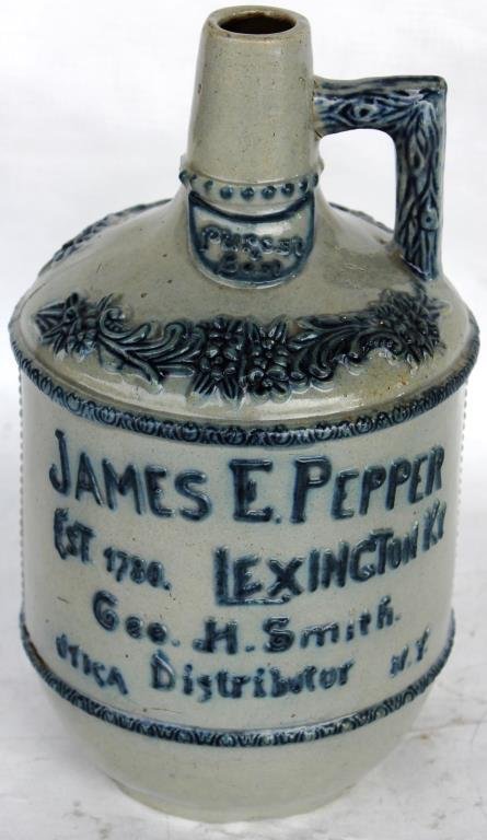 SALT GLAZE ADVERTISING JUG, JAMES E. PEPPER,: LEXINGTON KENTUCKY, GEORGE A. SMITH DISTRIBUTOR UTICA NEW YORK, EMBOSSED FLORAL DESIGN, 7 1/2" H