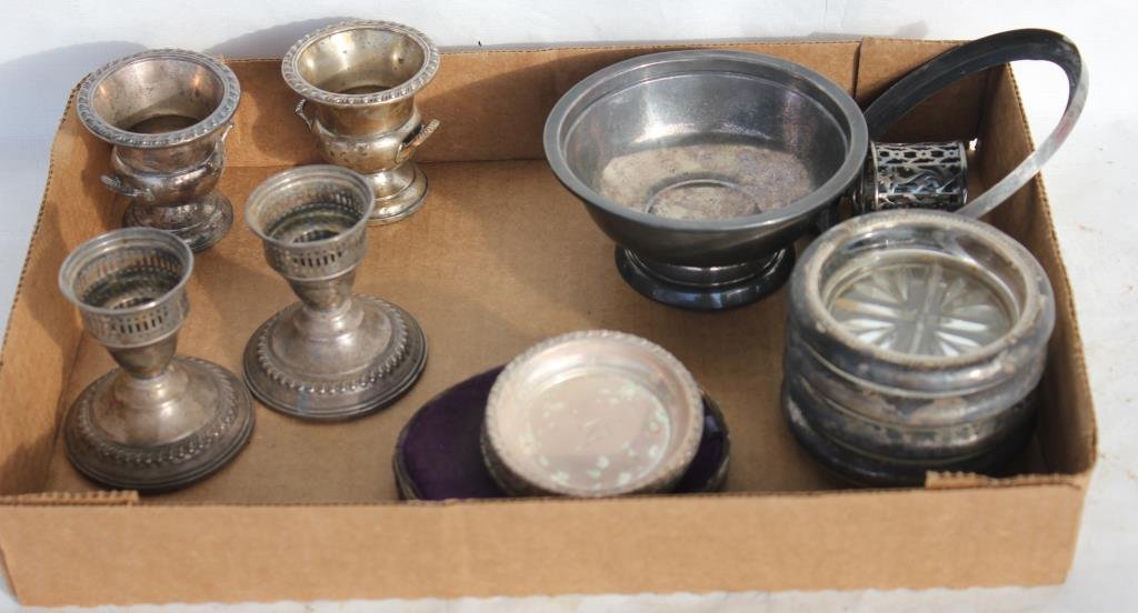 17 PCS. STERLING SILVER TO INCLUDE: BOWL, 6 NUT DISHES, MUSTARD JAR HOLDER, FRAME, TWO WEIGHTED CIGARETTE URNS, PAIR OF WEIGHTED CANDLESTICKS AND 4 RIMMED GLASS COASTERS,9.61 WEIGHABLE oz