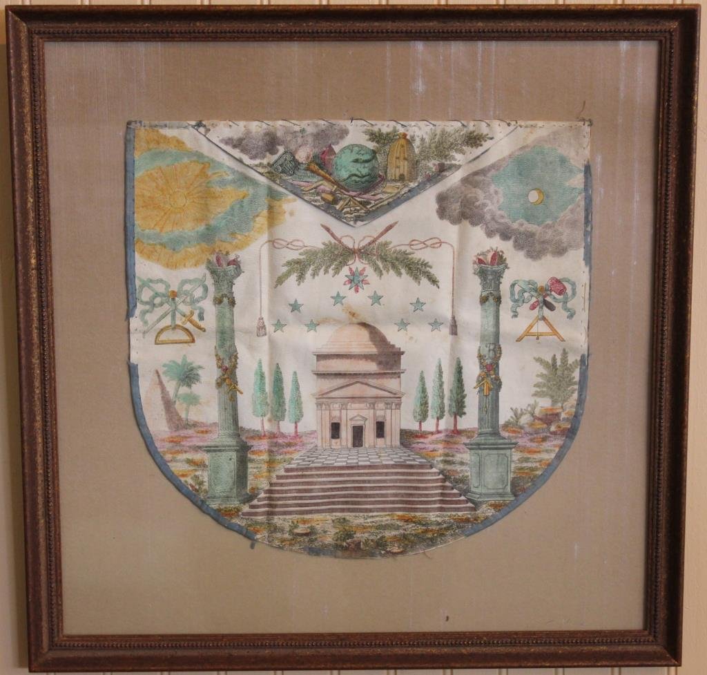 EARLY 19TH C. OIL ON VELLUM, MASONIC APRON: POLYCHROME DECORATION, WITH MONUMENTS, ETC. APRON 12 1/4" X 12 1/2" SOME RIBBON MISSING