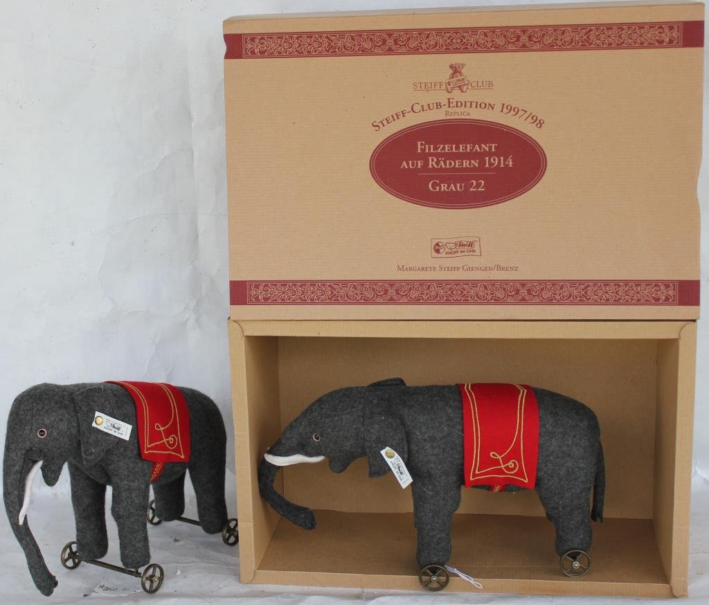 2 STEIFF ELEPHANT ON WHEELS 1914 REPLICAS - 1: IN BOX, 1 NOT, GREY 22, 1997/98. NO CONDITION ISSUES 7"X13" (IN BOX), 8"X11"