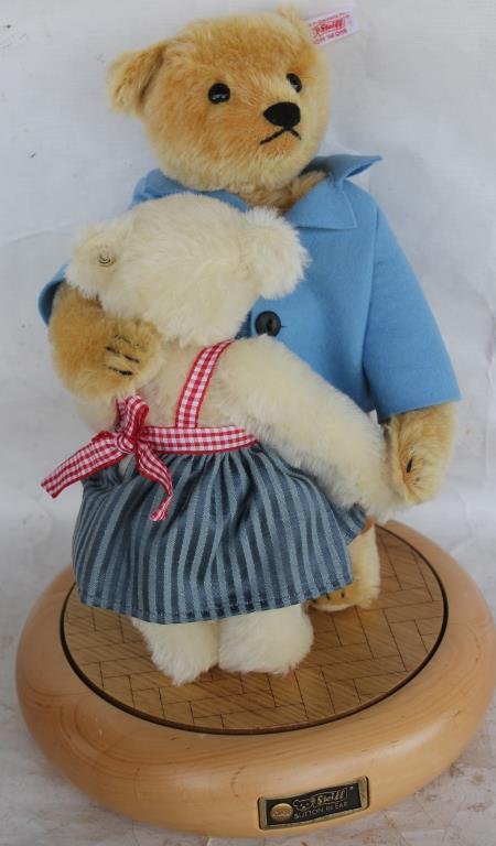 STEIFF DANCING BEAR COUPLE ON REVOLVING MUSIC: BOX BASE, PLAYS BLUE DANUBE. OVERALL HEIGHT IS 14"