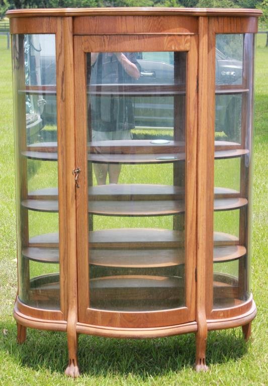 LATE 20TH C. OAK CURVED GLASS CHINA CLOSET (1 of 1)