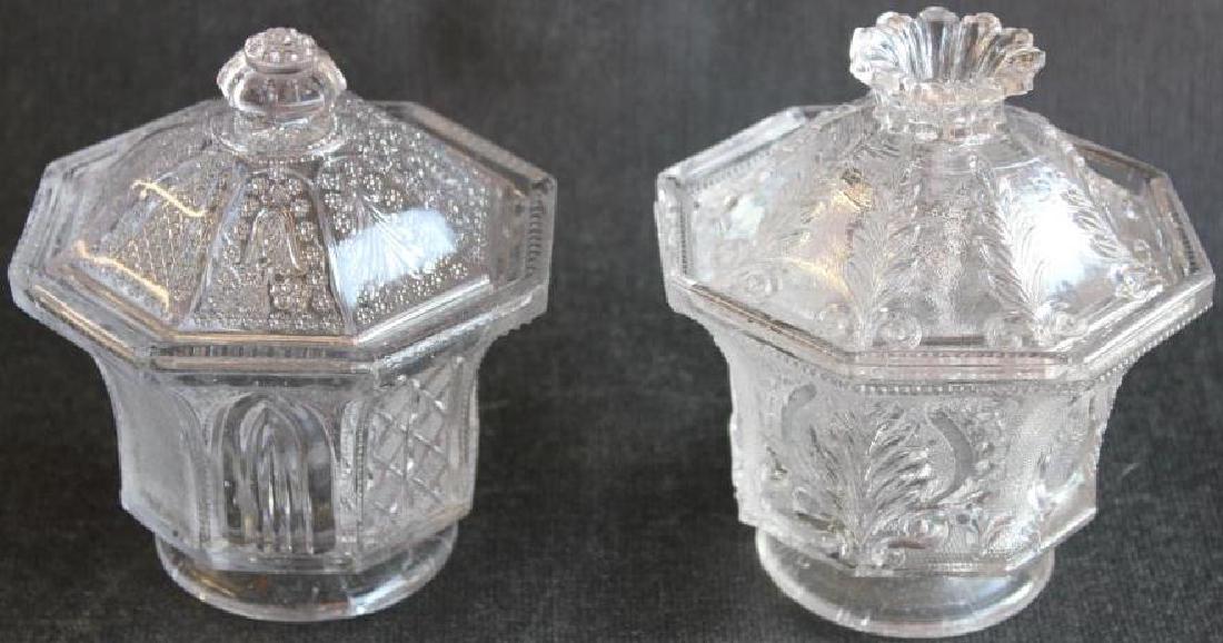 TWO EARLY 19TH C. LACY GLASS COVERED SUGAR BOWLS,: GOTHIC & ACANTHUS PATTERNS, 5" & 5 1/2" H, BOTH SHOW AVERAGE ROUGHAGE