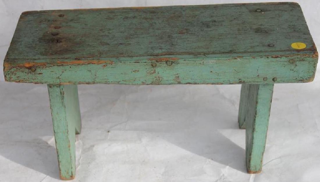 19TH C. GREEN PAINTED STOOL 8" H, 16" W, 6 1/2": D, TOGETHER WITH TRAMP STYLE CARVED & PAINTED WICKER DECORATION, 9 1/2" H, 12" W, 5 1/2" D ORIGINAL FINISH