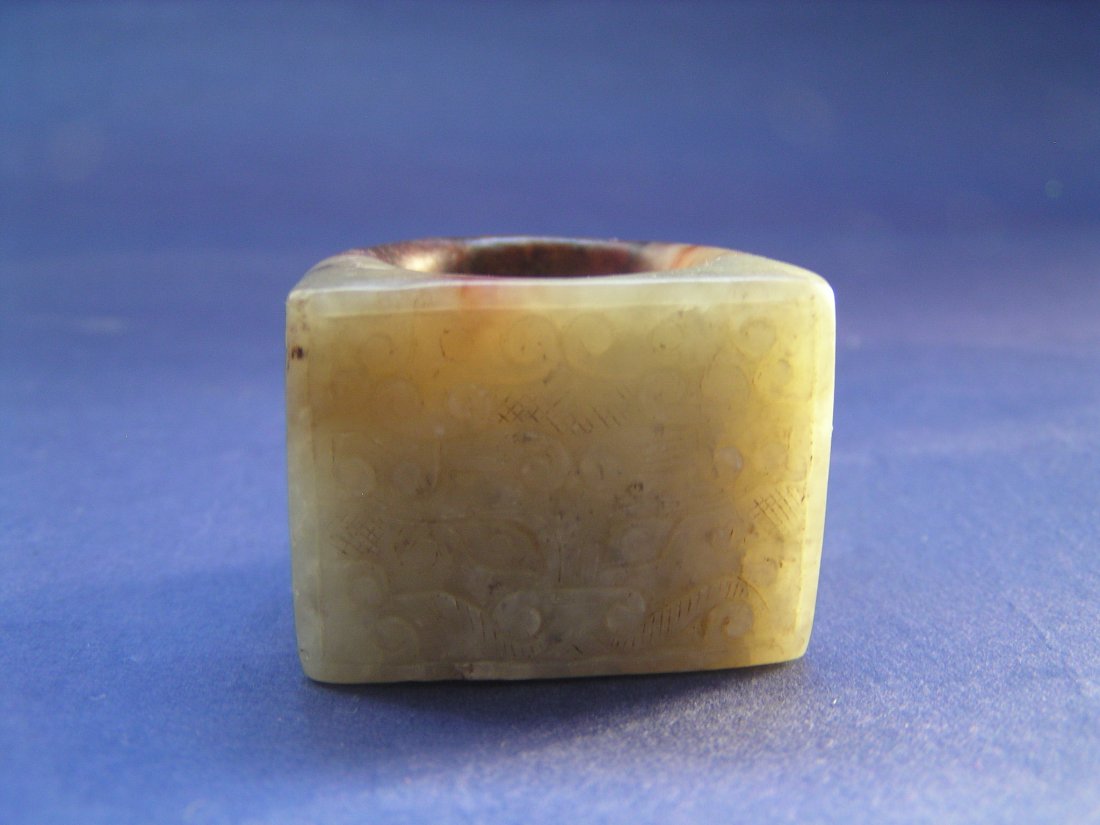 A Jade Ring.: Treasures from the private Collection of Dr. David So, who is an excellent collector and antiques restorer in Hong Kong, who collects most of the pieces from 1970 to 1980. W 3.5cm.