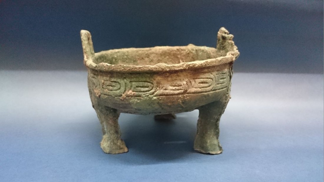 A Bronze Ding: Western Zhou, 11cm high x 13.5cm dia.