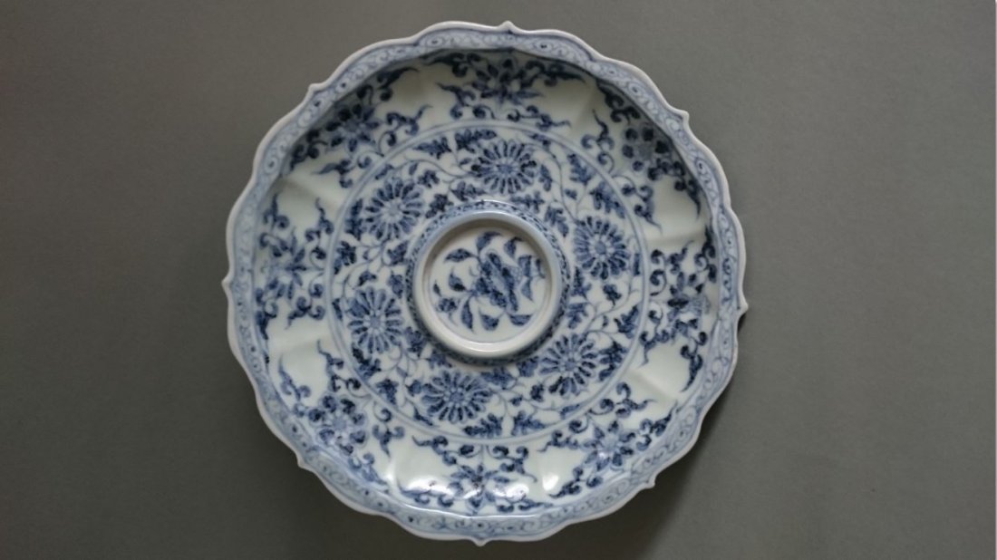 A Blue and White Plate: 20.5cm dia. Possibly Ming Dynasty.