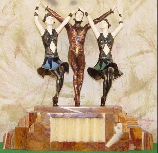Finale - Bronze, Ox Bone & Onyx, Sculpture by Chiparus: Stunning DEMETRE CHIPARUS (1886-1947) Patinated, and gilt-bronze, Ox Bone, on onyx & marble "3 dancers Final ". Engraved after Mark "D.H.Chiparus" on base. 22" x 22"Some variations of marble and patin