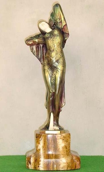 Signed Chiparus Bronze & Ivory - Odalisque (AFTER): Signed bronze and ivory art deco sculpture "Odalisque" by artist Chiparus, base signed with foundry mark, carved ivory beautiful patina bronze, sits on a marble/onyx base. ( AFTER )