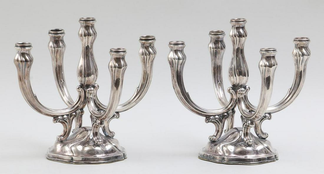 Pair of Wilhelm Binder, German .835 silver: Pair of Wilhelm Binder, German .835 silver, Art Nouveau five light candelabras, weighted, hallmarked. Wear from use. 10''h, 10-3/4''w.
