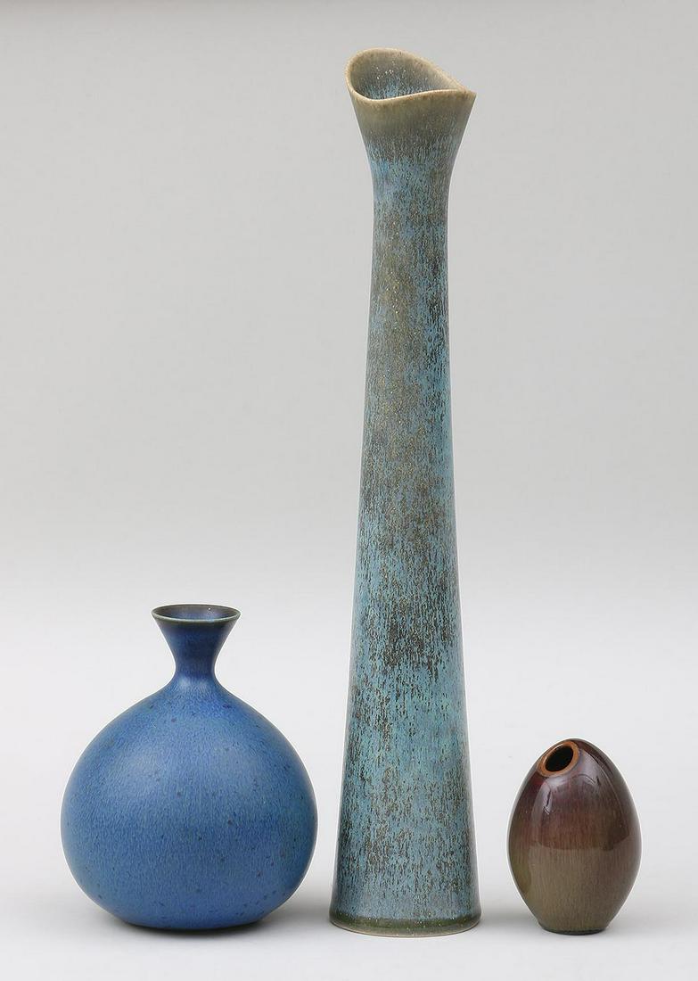 Group of (3) Stig Lindberg miniature ceramic vase: Group of (3) Stig Lindberg miniature ceramic vases, to include: brown egg form; blue round; and tall brown and tan. All signed. Largest 11-3/4"h, 2"w.