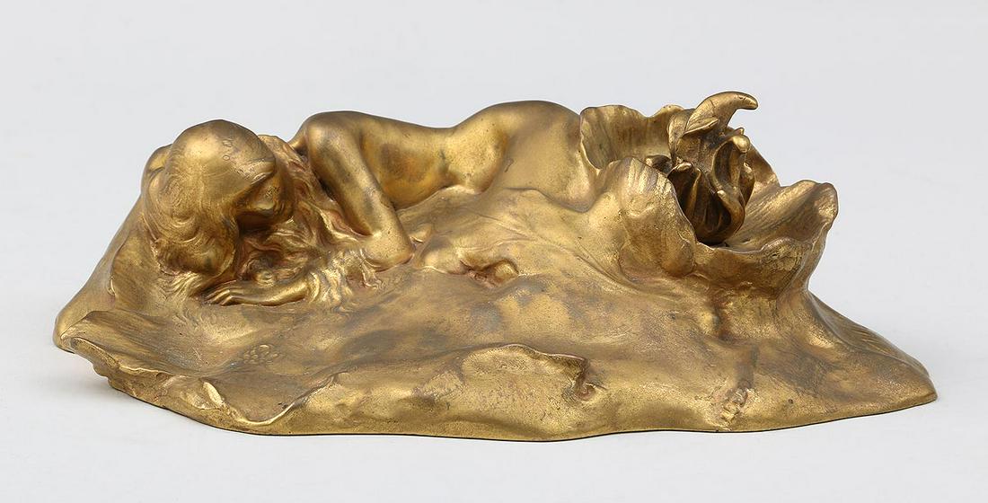 ALEXANDRE CLERGET (French, 1856-1931): ALEXANDRE CLERGET (French, 1856-1931), bronze inkwell of reclining nude with large flower and stamen lid, signed. Minor wear to gilding. 2-1/2''h, 9-1/2''w, 8''d.