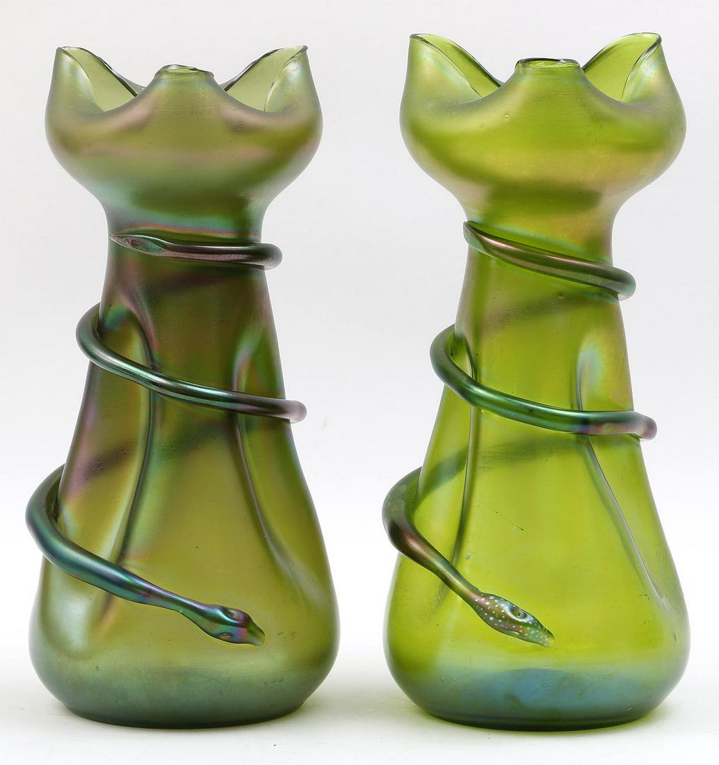 Pair of Loetz iridescent glass snake vases: Pair of Loetz iridescent glass snake vases, one signed ''Loetz, Austria''. 13''h.