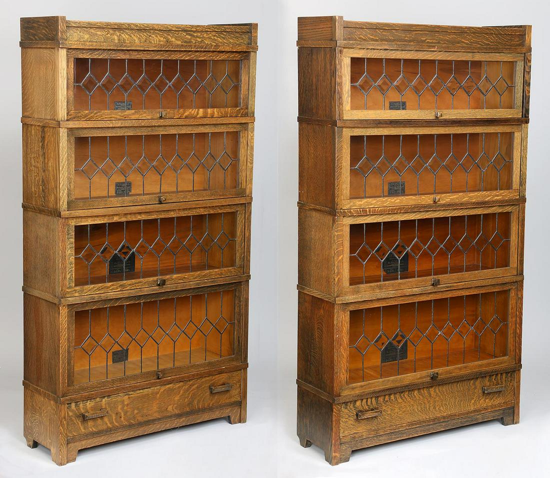 Pair of Globe-Wernicke Co. sectional bookcases: Pair of Globe-Wernicke Co. sectional bookcases with leaded glass doors, ''Grade 798'', sizes D8-1/2, D10-1/4, D12-1/4. Wear from use. 69-1/2''h, 34-1/4''w, 11''d.