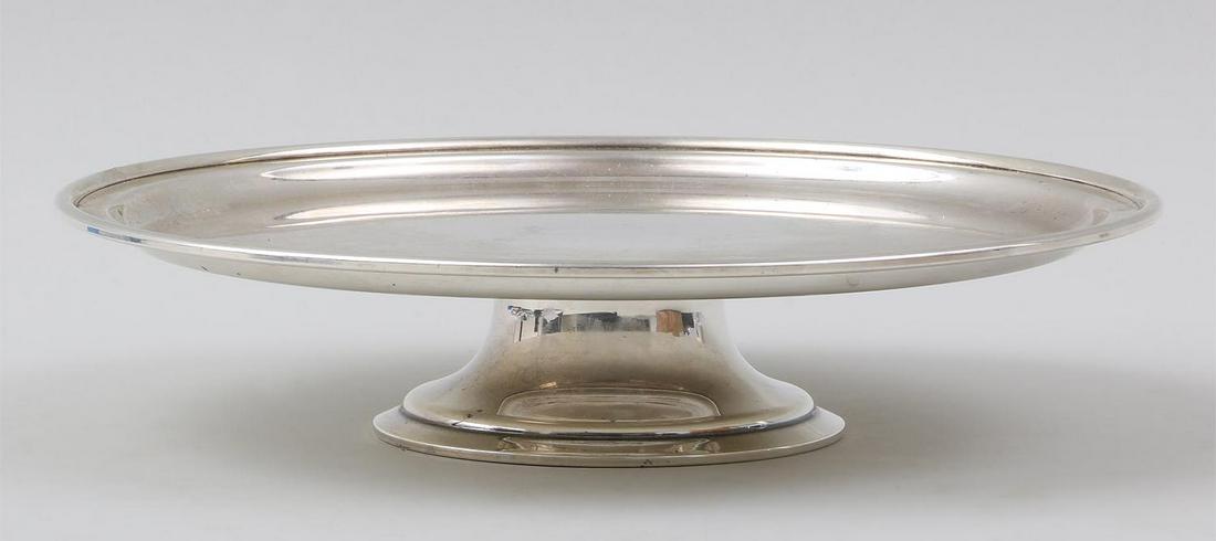 Tiffany and Co. Makers sterling silver footed cake: Tiffany and Co. Makers sterling silver footed cake stand, marked. 2-3/8''h, 11''dia. Total approximate weight 27.8 troy oz.
