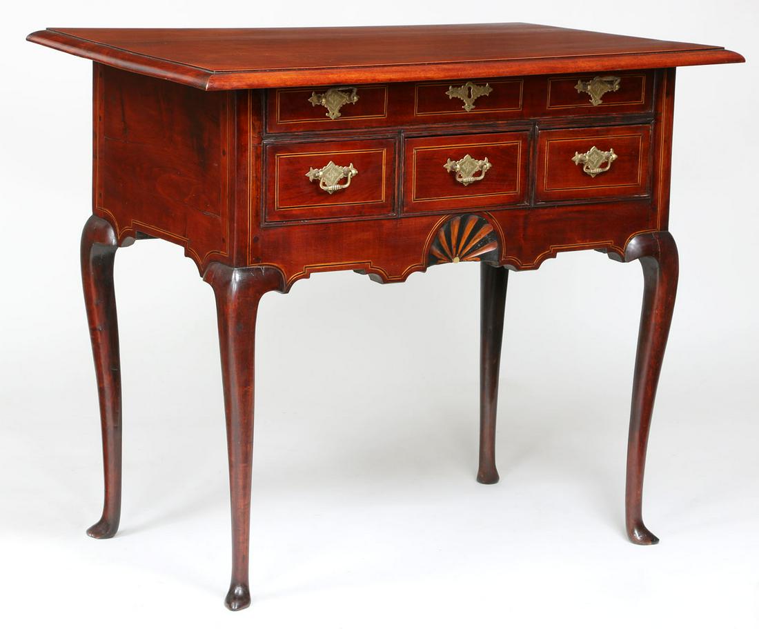 19th century American lowboy: 19th century American lowboy with line inlay and shell decoration, having a single top drawer over three short drawers. Restored with replacements and refinishing. 29-1/2''h, 34-1/2''w, 22''d.