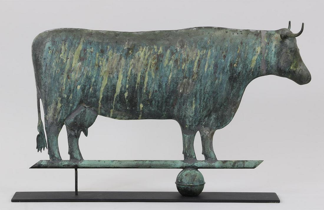 Full bodied copper cow weathervane: Full bodied copper cow weathervane, mounted on iron base. 15-1/4''h, 24''w, (excluding base).