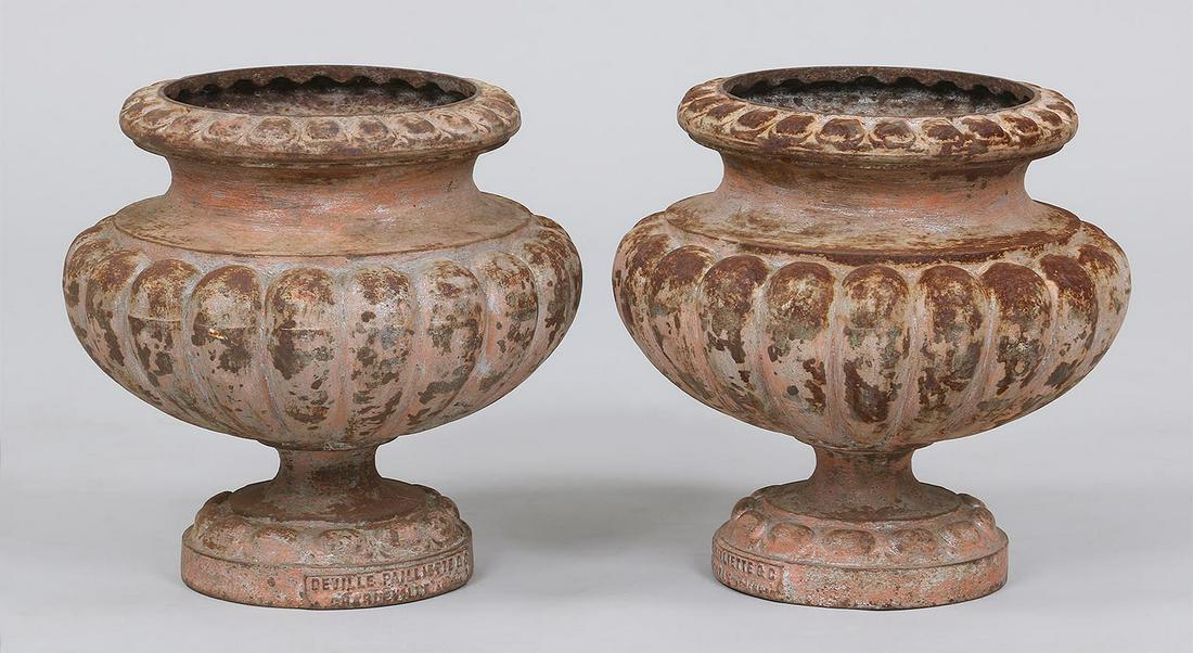 19C small cast iron bulbous urns: Pair of 19th century small cast iron bulbous urns, marked Deville Pailliette & Co. 11''h.