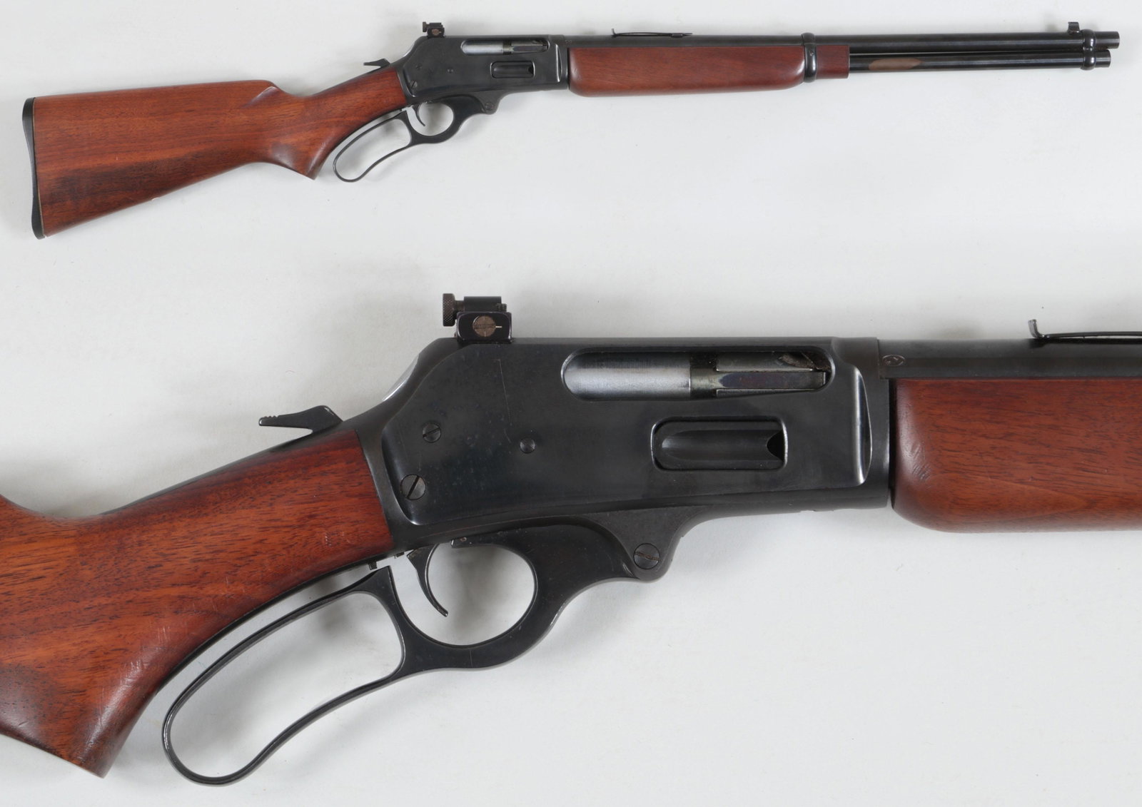 Marlin Model 336 R.C. Lever Action Carbine: Marlin Model 336 R.C. Lever Action Carbine in 35REM. The tapered barrel measures 20'' with open sights and a Williams adjustable peep sight. The bore is excellent. The plain walnut pistol grip stock e