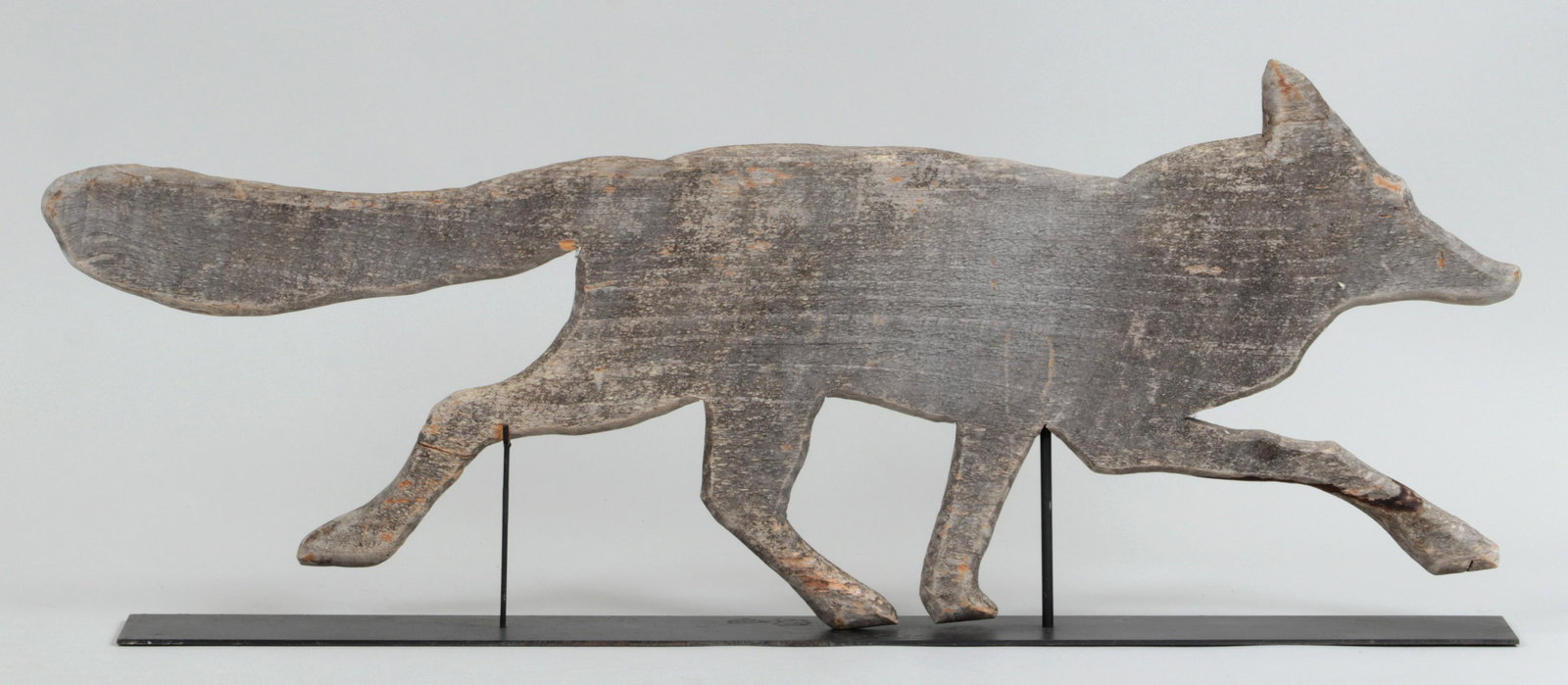 Carved wood fox weathervane: Carved wood fox weathervane. Repair to back leg. 12-1/2''h, 31-3/4''w.