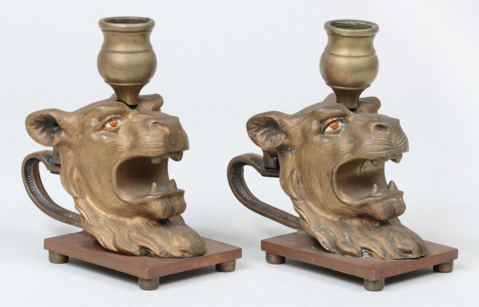 Pair of bronze lion head taper candle holders (1 of 4)