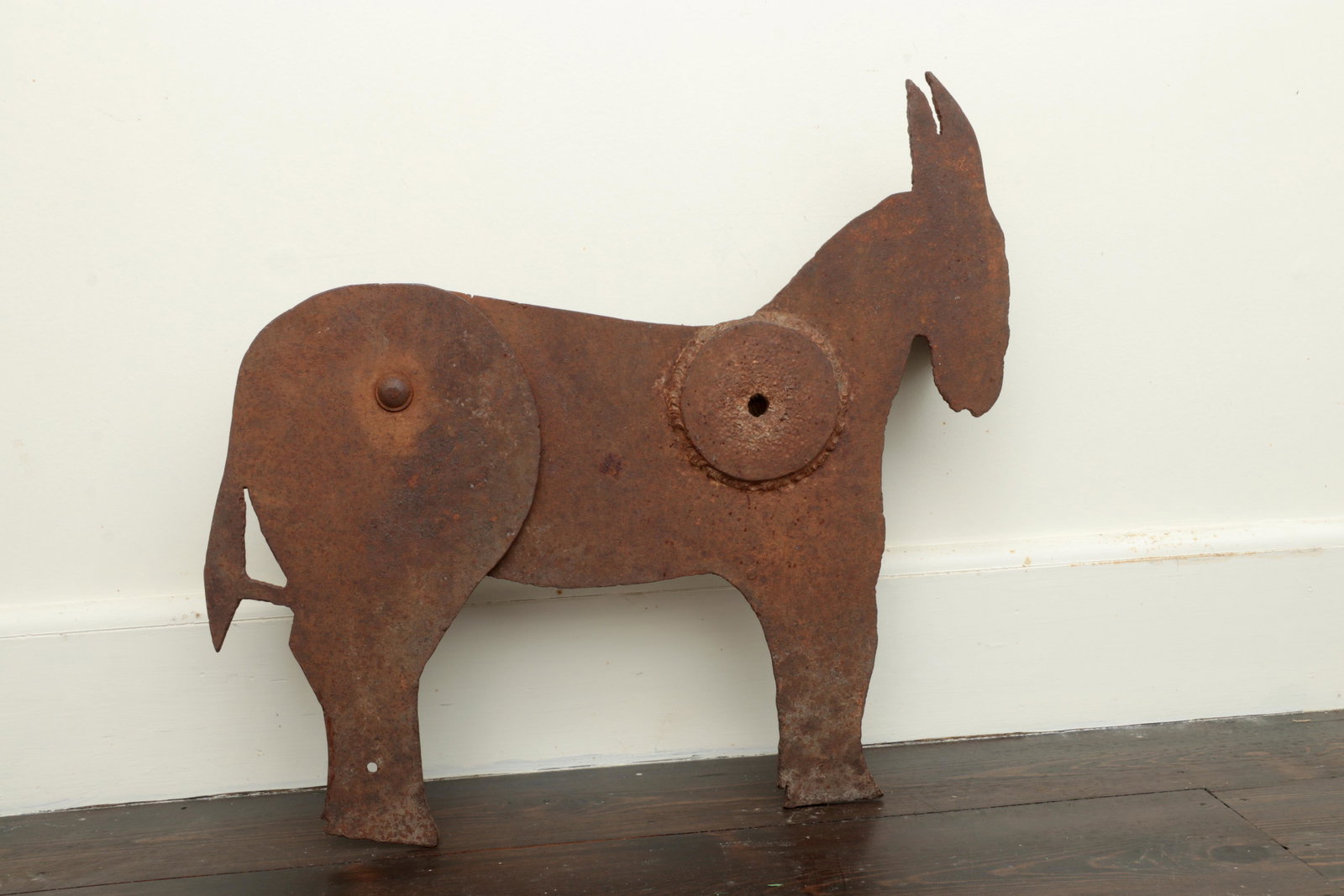 Kicking iron donkey target: Kicking iron donkey target. 20-3/4''h, 24''w, 5''d.