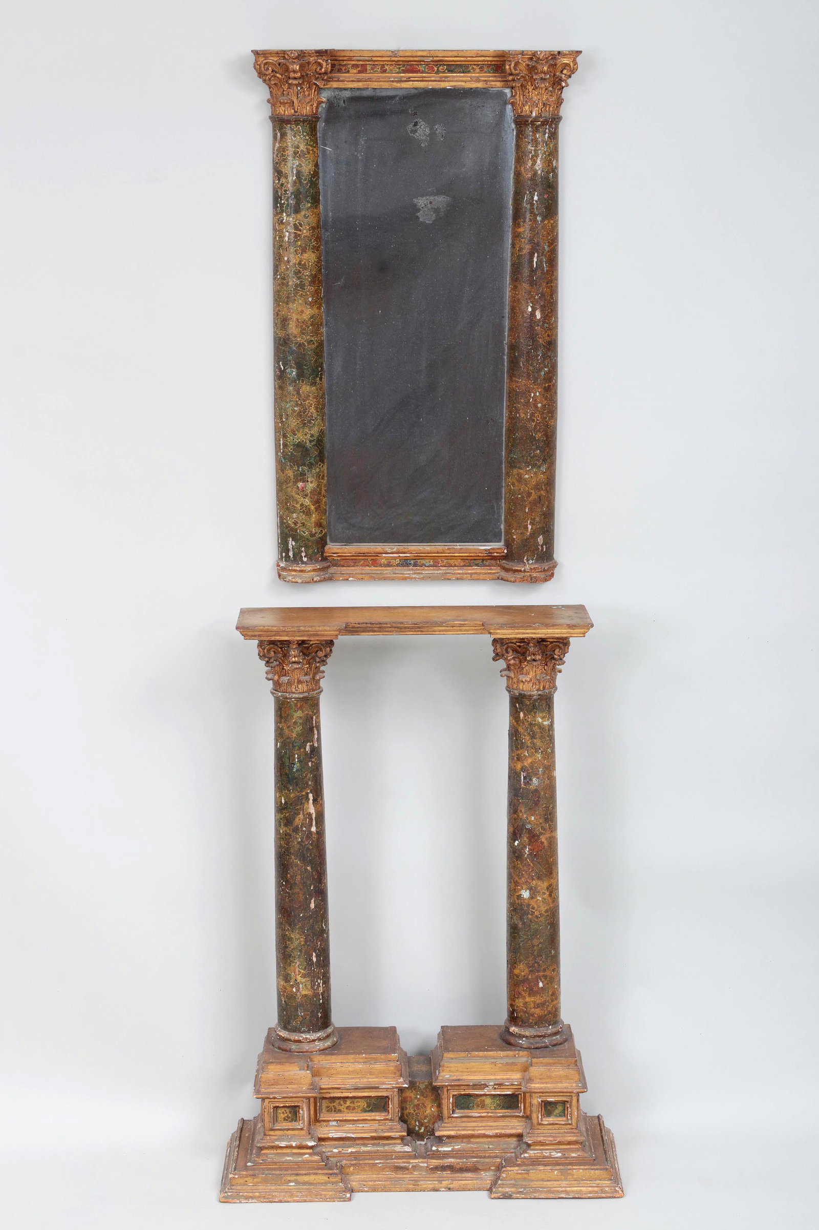 Renaissance tabernacle: Renaissance tabernacle gilt frame with painted faux marble columns; and matching mirror with half columns. Wear from age, losses. Mirror 35''h, 21-1/2''w; frame 38-1/4''h, 27''w, 9-1/4''d.