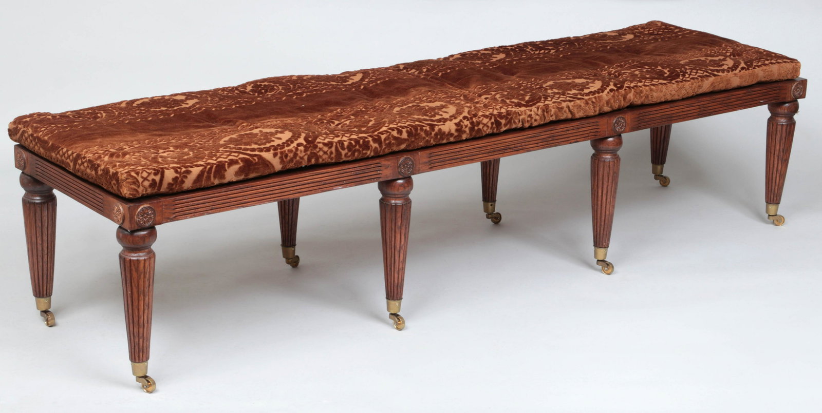 Louis XVI style bench: Louis XVI style bench with cane seat and cushion, 20th century. 16-1/4''h, 78-1/4''w, 20-1/4''d.